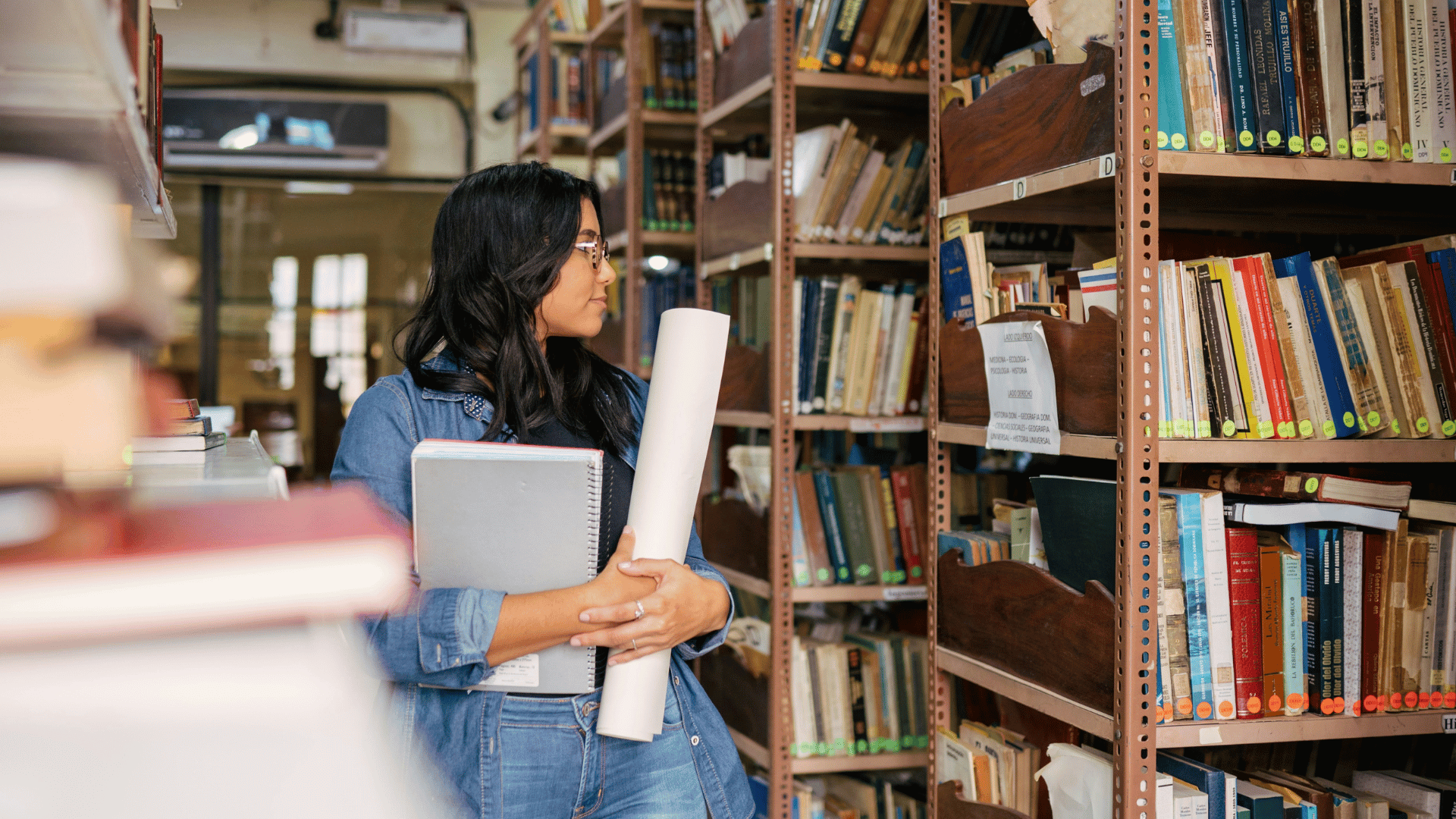 young woman using her travel & research award